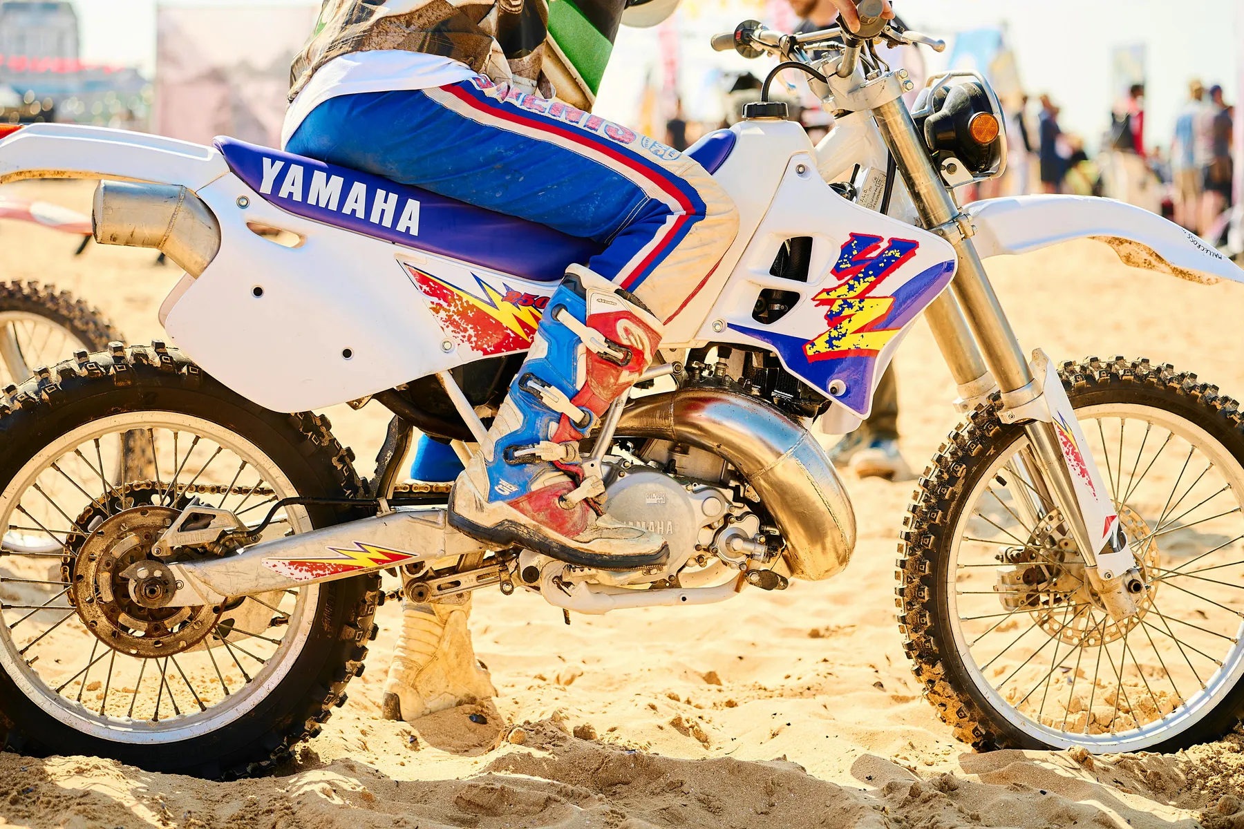 A Yamaha YZ250 dirt bike on a sand track